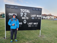 April 2021 - Steve Bignell with the new scoreboard he donated to the club